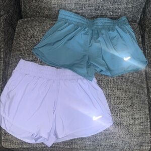 2 Nike Women's Mid Rise Dri-fit Shorts 2025